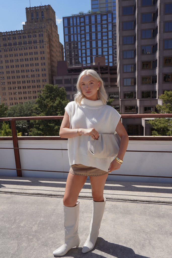 Cream Sleeveless Turtleneck Sweater